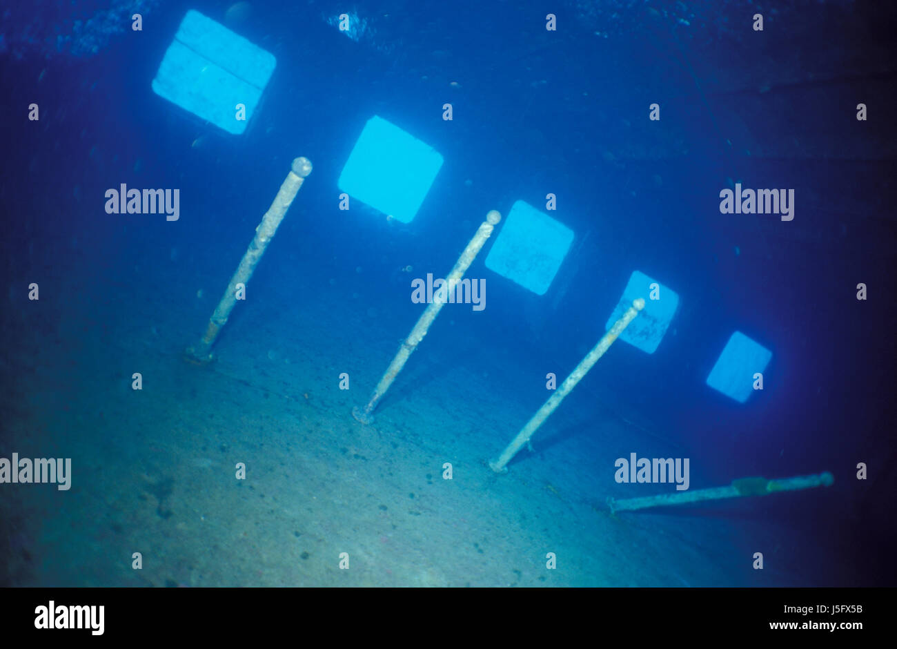 blue underwater oblique dive wreck rapt shipwreck canteen sunk sailing boat Stock Photo