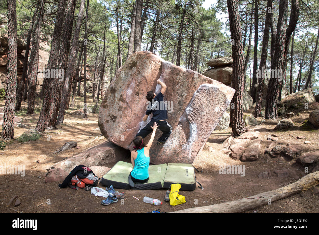 climbers bouldering in Albarracin, Spain Stock Photo