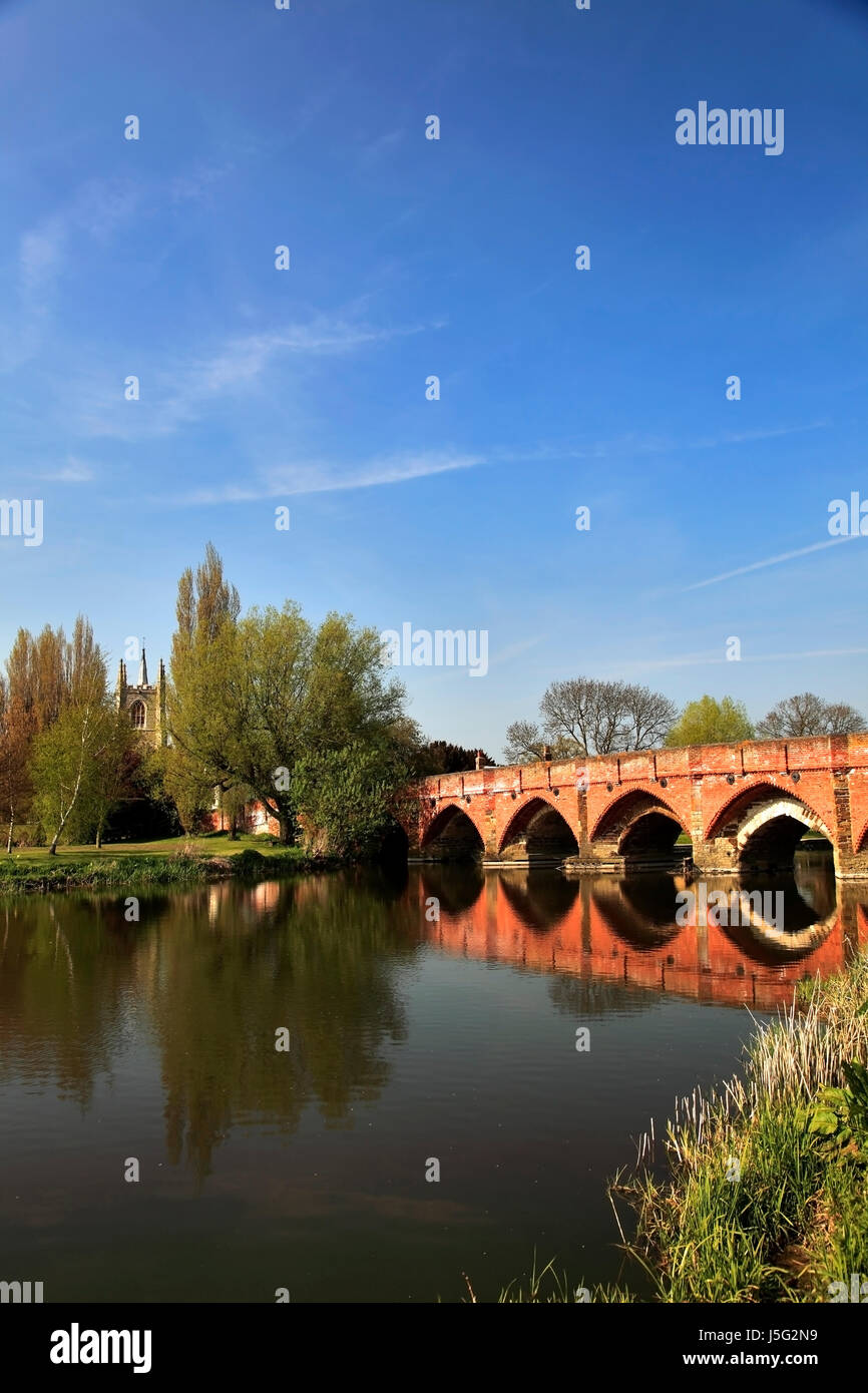 Boat and bridge over the river Great Ouse, Great Barford village