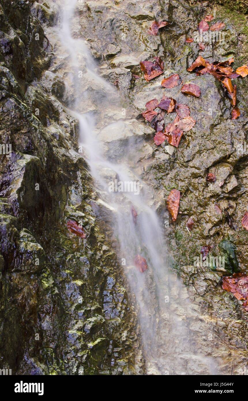 stone cold romanticism rock waterfall autumnal atmosphere long-term admission Stock Photo