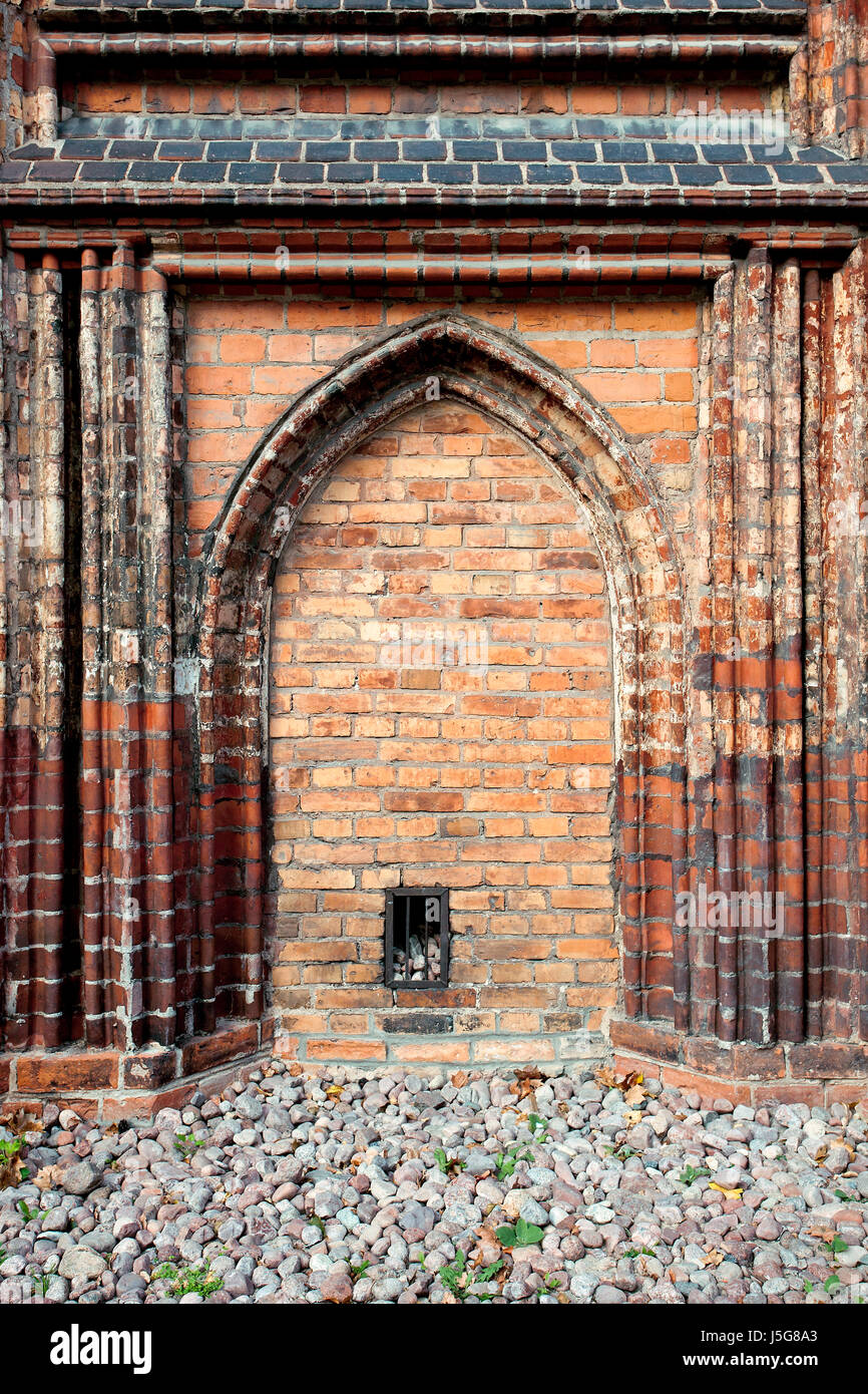 Old door blocked by brickwall Stock Photo
