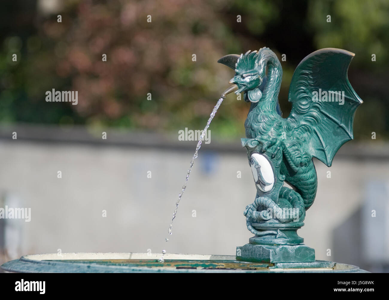 city town symbolic death animal green switzerland fountain dragon mythology Stock Photo