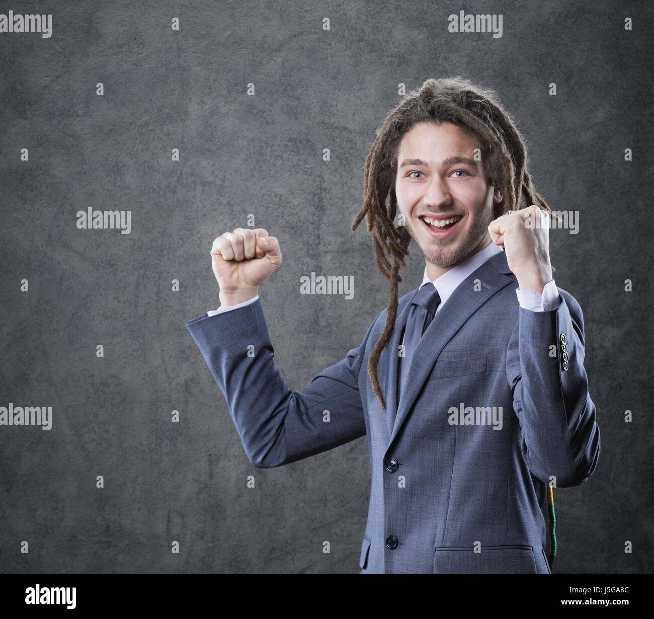 Joyful young man celebrates hi-res stock photography and images - Alamy