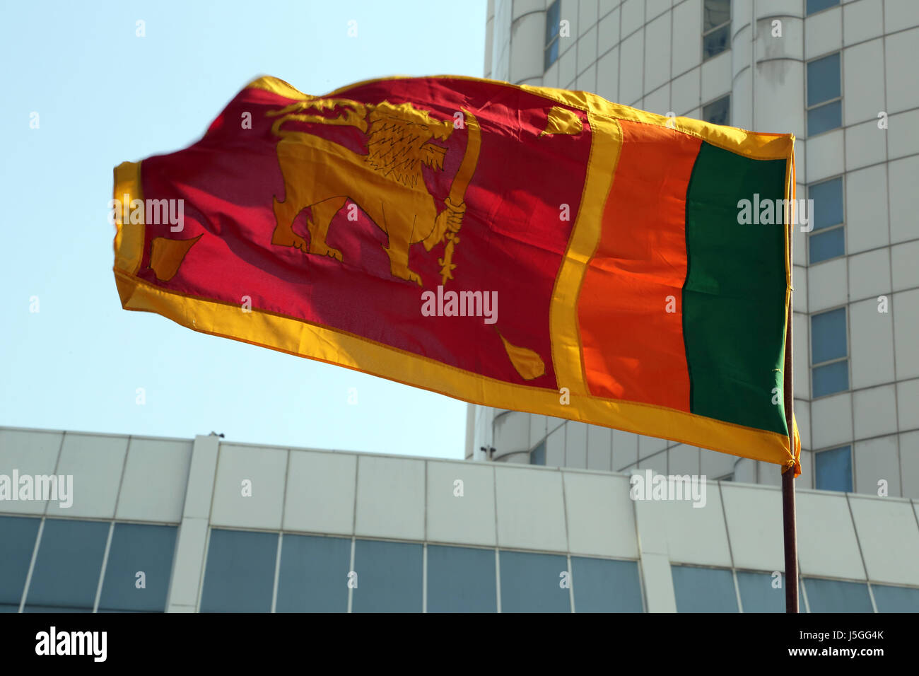Fort Colombo Sri Lanka Close up of Sri Lankan Flag outside Bank of Ceylon Stock Photo