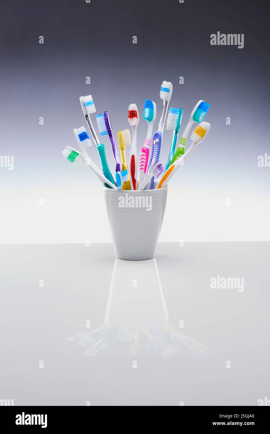 Pot of Toothbrushes Stock Photo