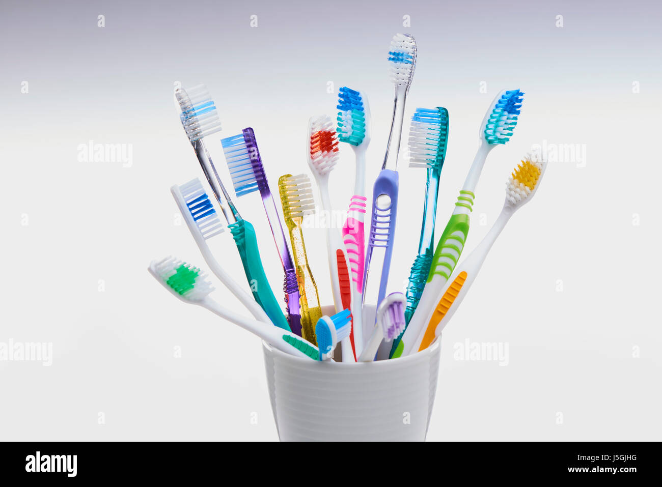 Pot of Toothbrushes Stock Photo