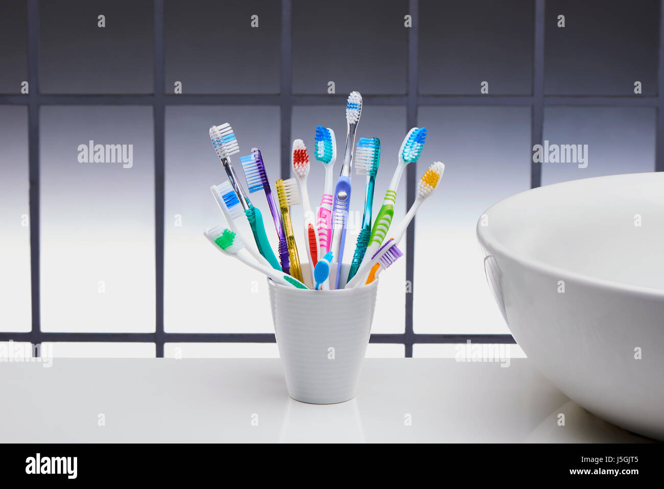 Pot of Toothbrushes Stock Photo