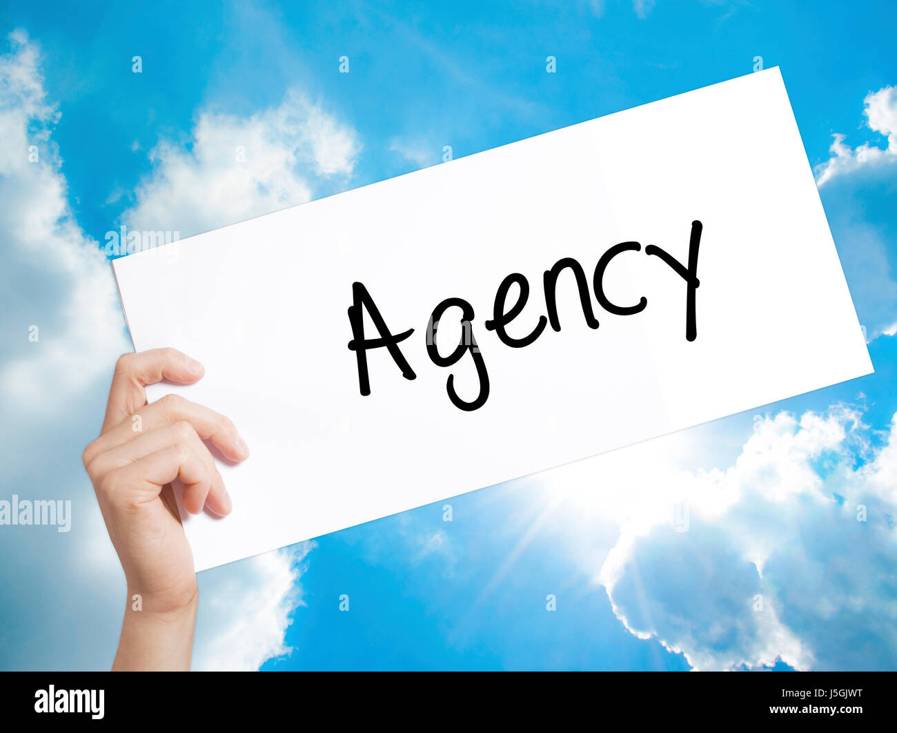 Agency Sign on white paper. Man Hand Holding Paper with text. Isolated ...