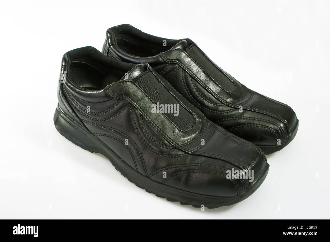 walk go going walking black swarthy jetblack deep black shoes leather business Stock Photo
