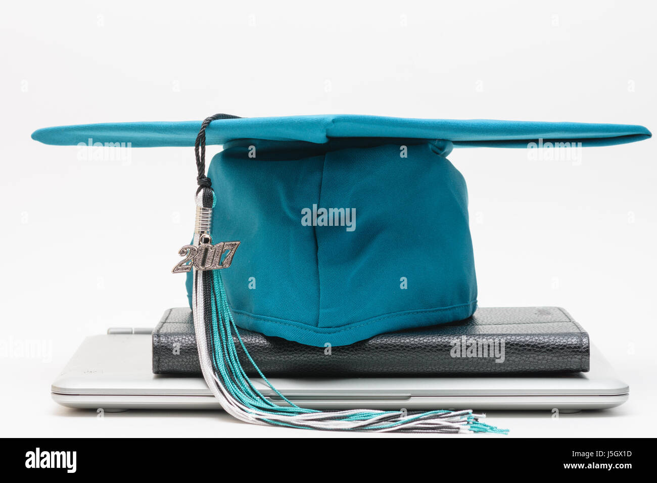 Laptop and other technology graduation concept Stock Photo - Alamy