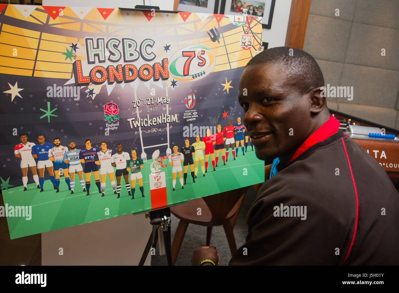 London, UK. 17th May 2017. Kenya captain, Andrew Amonde signing the Captain Lineup Poster during the HSBC London Sevens World Series press event. The final leg of the series will be held at Twickenham Stadium on the 20th and 21st of May 2017. Credit: Elsie Kibue / Alamy Live News Stock Photo