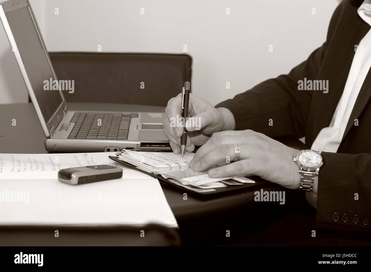 telephone phone bank lending institution office note memo laptop ...