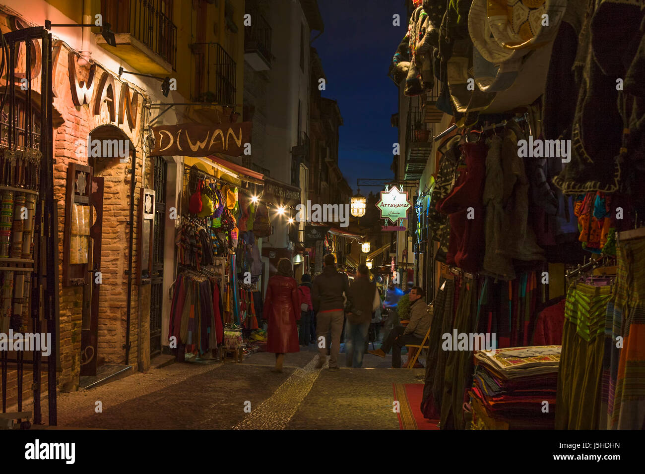 Calle Calderería Nueva, El Albaicín, Granada, Spain at night: a line of tourist souvenir shops Stock Photo
