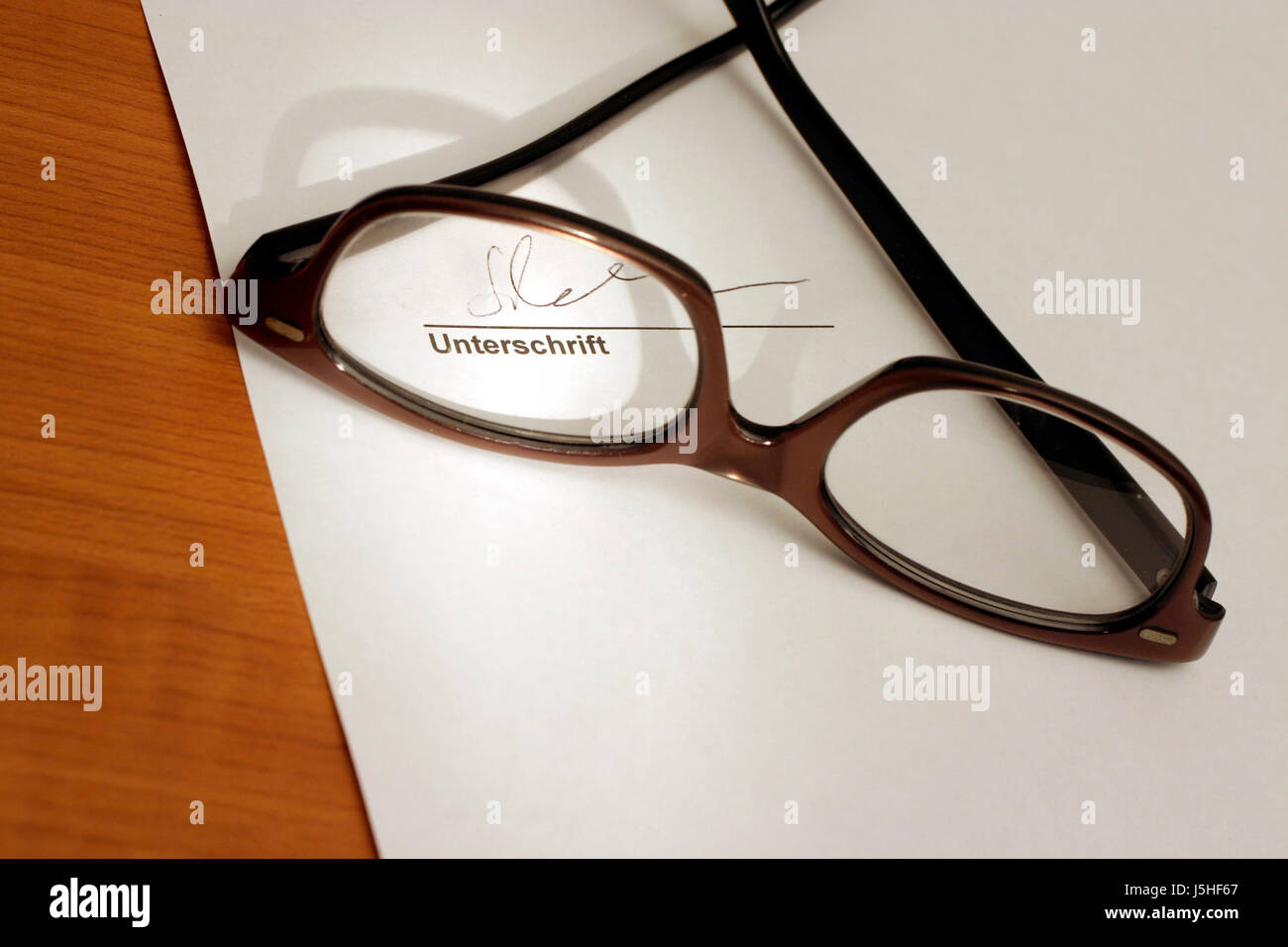 contract look glancing see view looking peeking looking at spectacles glasses Stock Photo