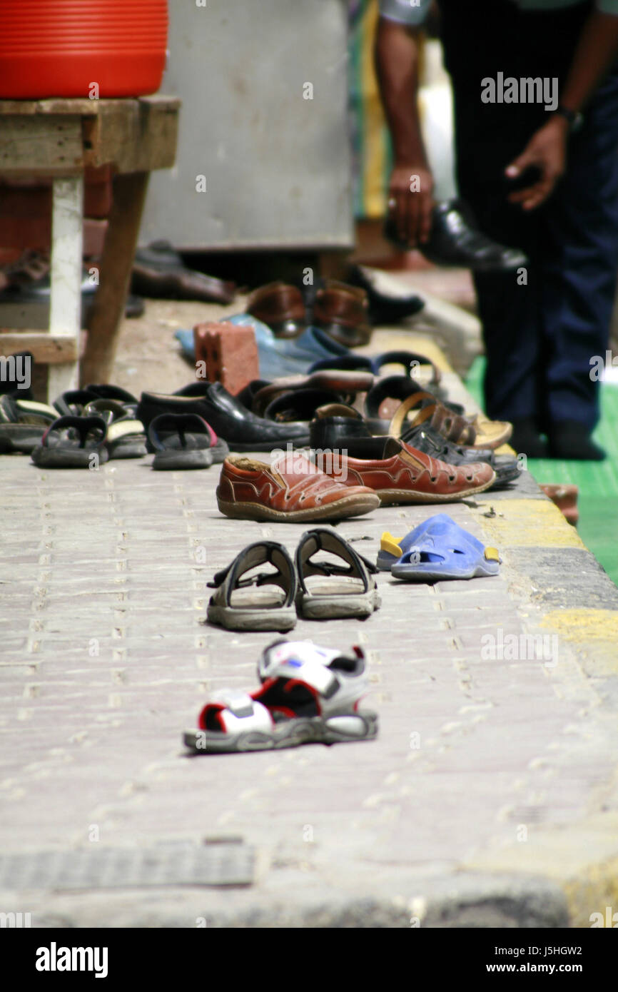 religion shoes pray egypt arab muslim street road shoe move out break