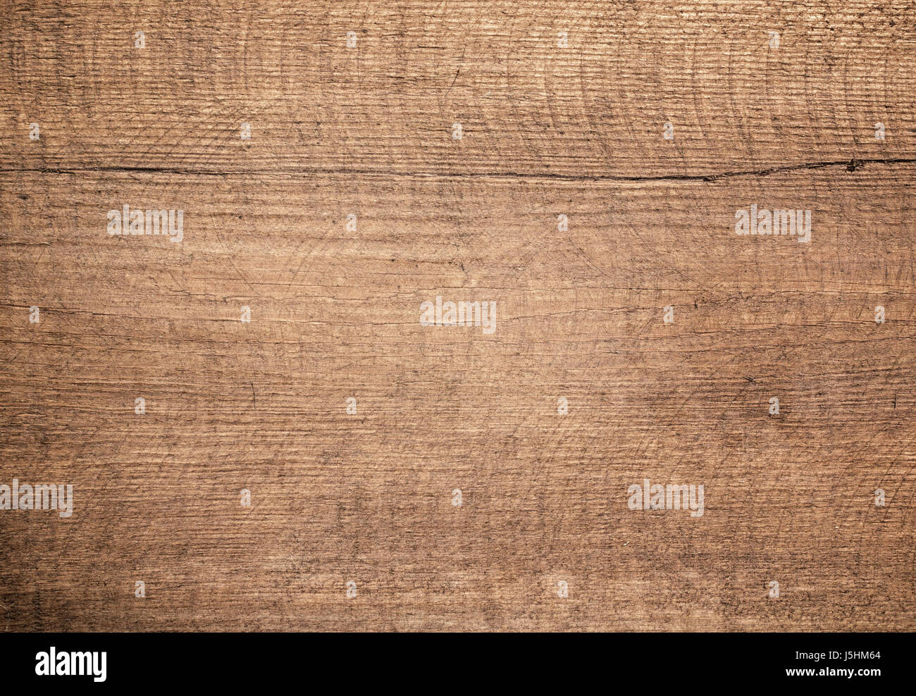 Brown scratched wooden cutting, chopping board. Wood texture. Stock Photo