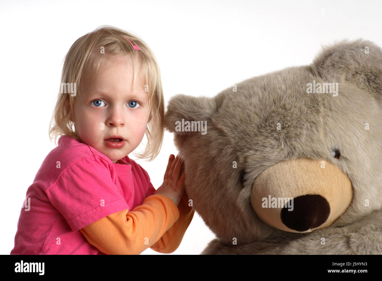 Toddler cuddling stuffed animal hi-res stock photography and images - Alamy