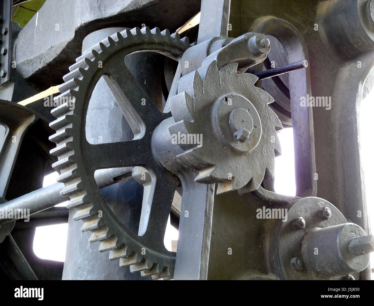 industry engineering nostalgia iron wheel cogwheel tooth progress mechanics Stock Photo