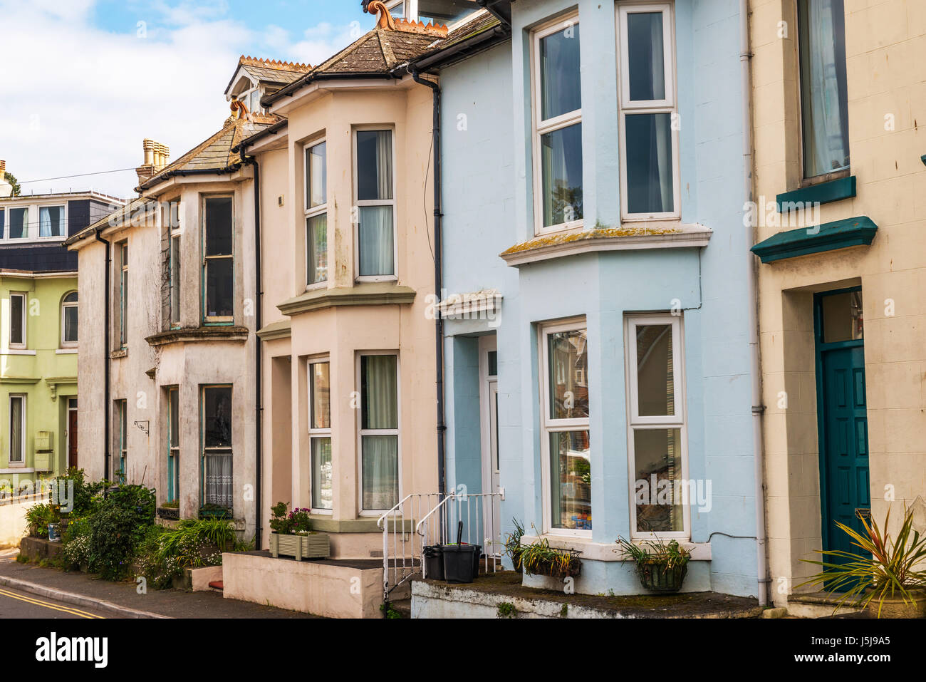 Typical English architecture, residential buildings in a row along the ...