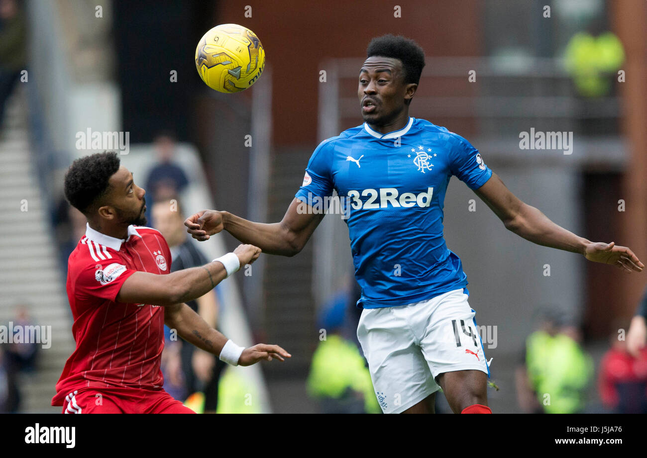 Rangers Joe Dodoo (right) and Aberdeen Shay Logan (left) during the Ladbrokes Scottish Premiership match at Ibrox Stadium, Glasgow. PRESS ASSOCAITION Photo. Picture date: Wednesday May 17, 2017. See PA story SOCCER Rangers. Photo credit should read: Jeff Holmes/PA Wire. EDITORIAL USE ONLY Stock Photo