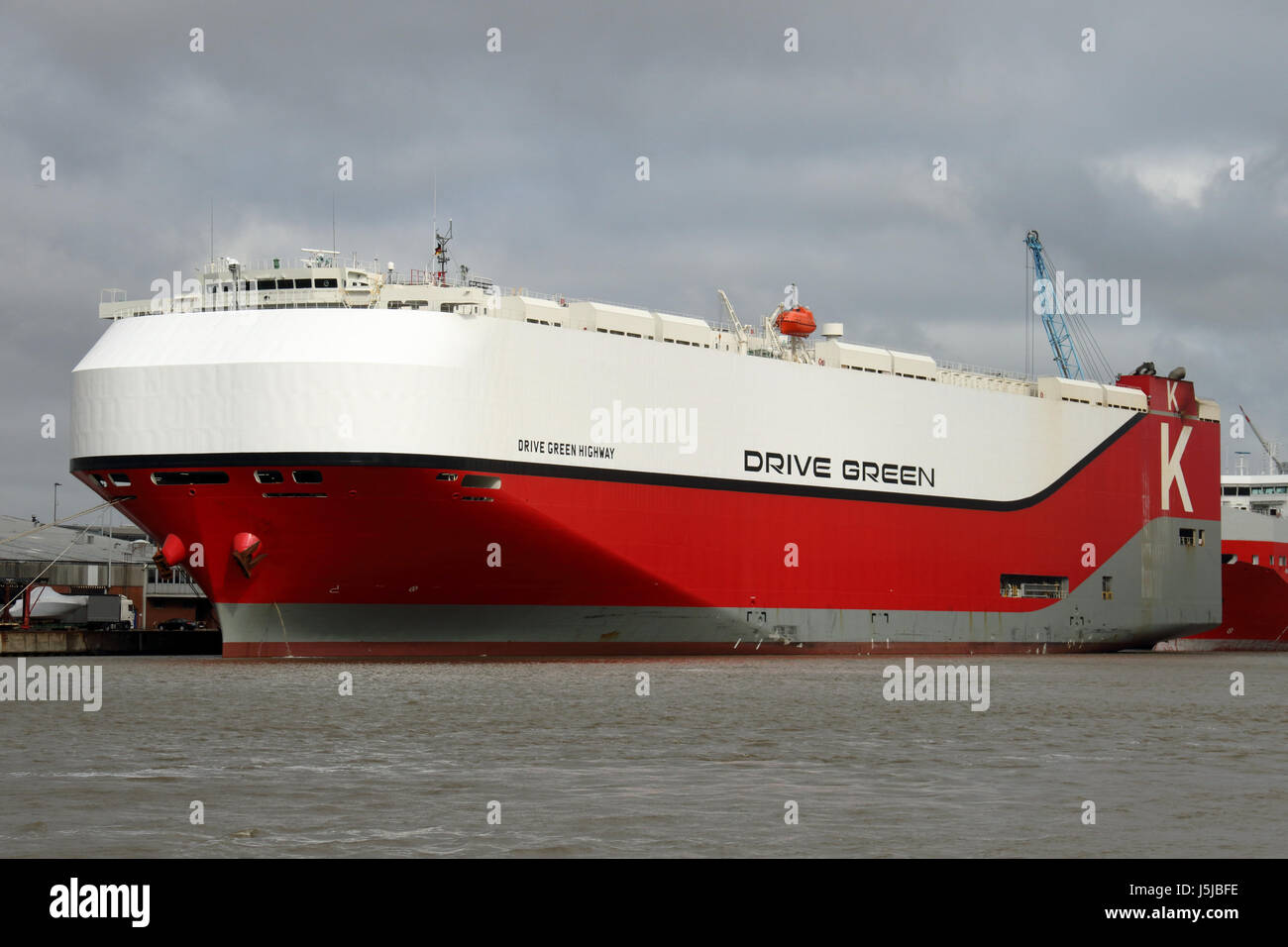 Car Carrier Drive Green Highway in Bremerhaven Stock Photo