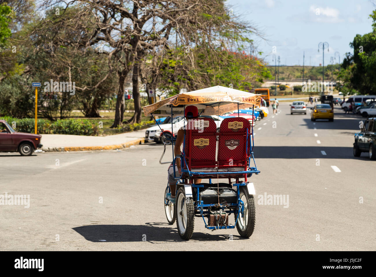 A bicycle rickshaw or bicycle taxi in Havana, Cuba Stock Photo