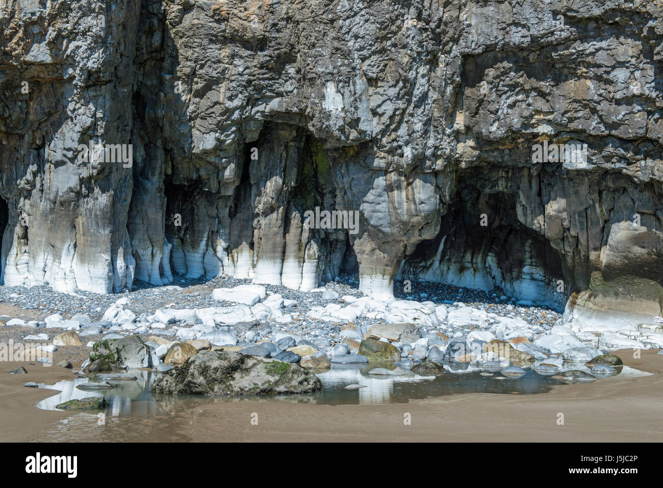 Limestone Caves at Pendine Sands Carmarthenshire south Wales Stock