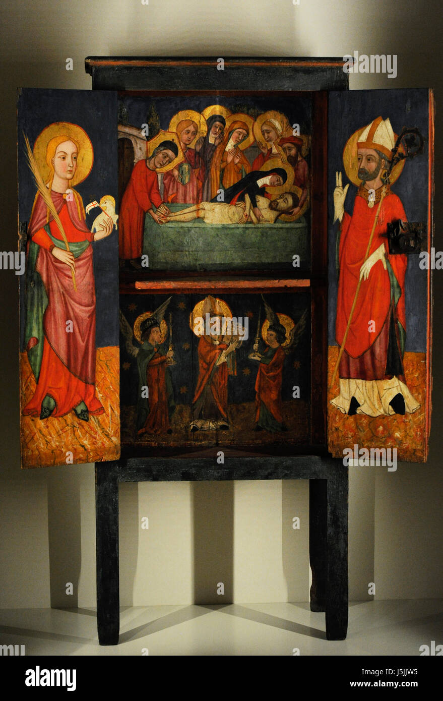 Anonymous. Catalonia. Roussillon. Liturgical cabinet with the Holy Burial, Saint Agnes and a Bishop Saint, ca.1400. Probably from Perpignan. National Art Museum of Catalonia. Barcelona. Catalonia. Spain. Stock Photo