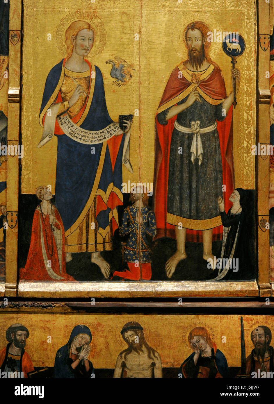 Master of Santa Coloma de Queralt (active in the third quarter of the 14th century). Altarpiece of the Saints John. ca.1356. Detail depicting Saint John the Baptist and Saint John the Evangelist with three donors. From the Chapel of the Castle of Santa Coloma de Queralt (Catalonia). National Art Museum of Catalonia. Barcelona. Catalonia. Spain. Stock Photo