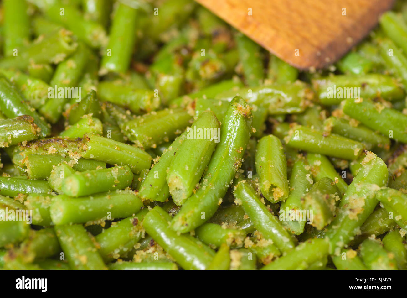 Fried green beans in a crispy bun and a spoon Stock Photo Alamy