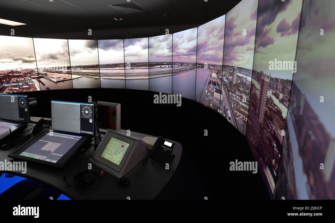 The 225 degree panoramic TV screens and control desk, part of the operations room at National Air Traffic Services (NATS) Swanwick in Hampshire, which will direct aircraft at London City Airport using the UK's first remote digital air traffic control tower. Stock Photo