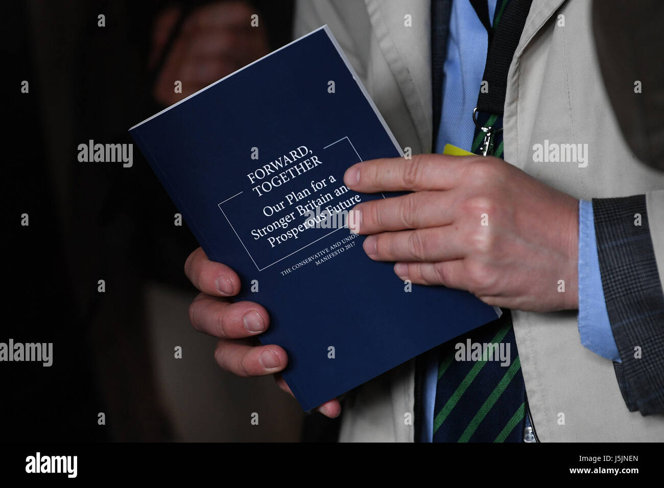A man holds the Conservative Party general election manifesto during ...