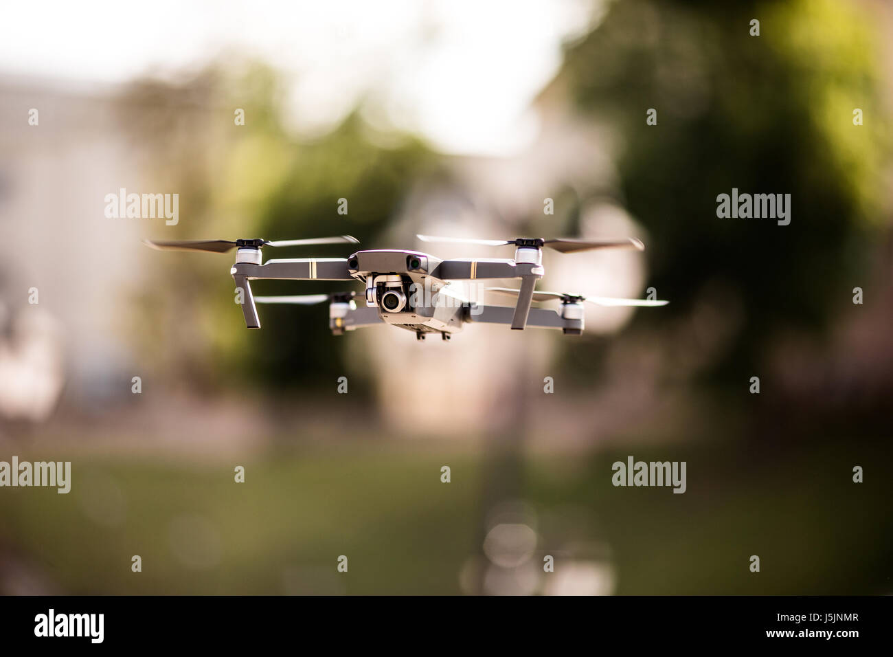 drone quad copter with high resolution digital camera flying hovering ...