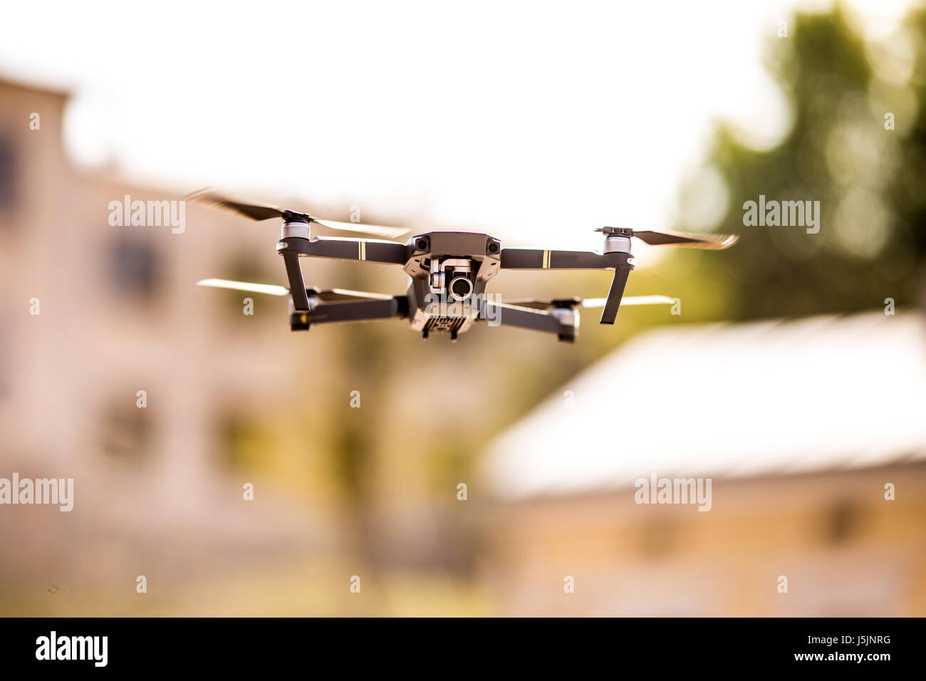 drone quad copter with high resolution digital camera flying hovering ...