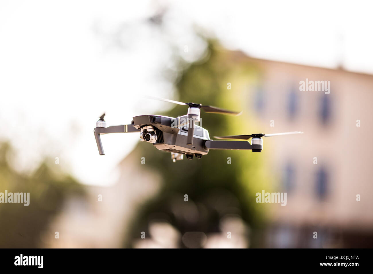 drone quad copter with high resolution digital camera flying hovering ...