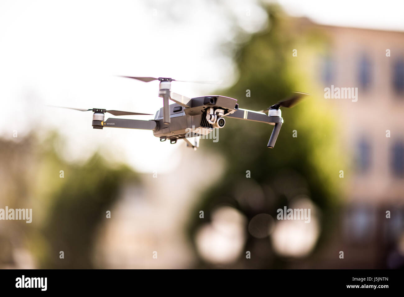 drone quad copter with high resolution digital camera flying hovering ...