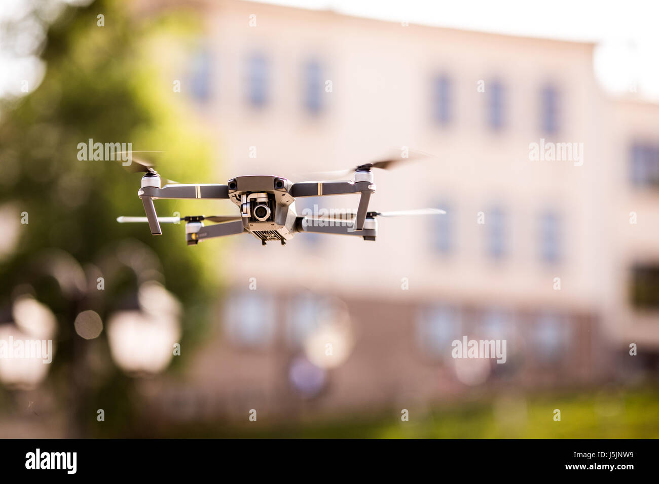 drone quad copter with high resolution digital camera flying hovering ...