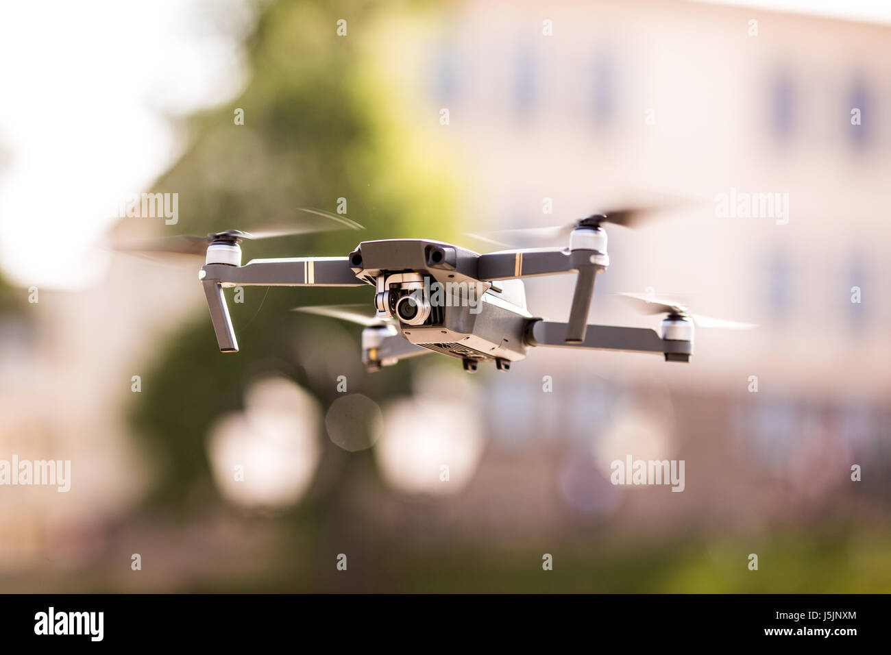 drone quad copter with high resolution digital camera flying hovering ...