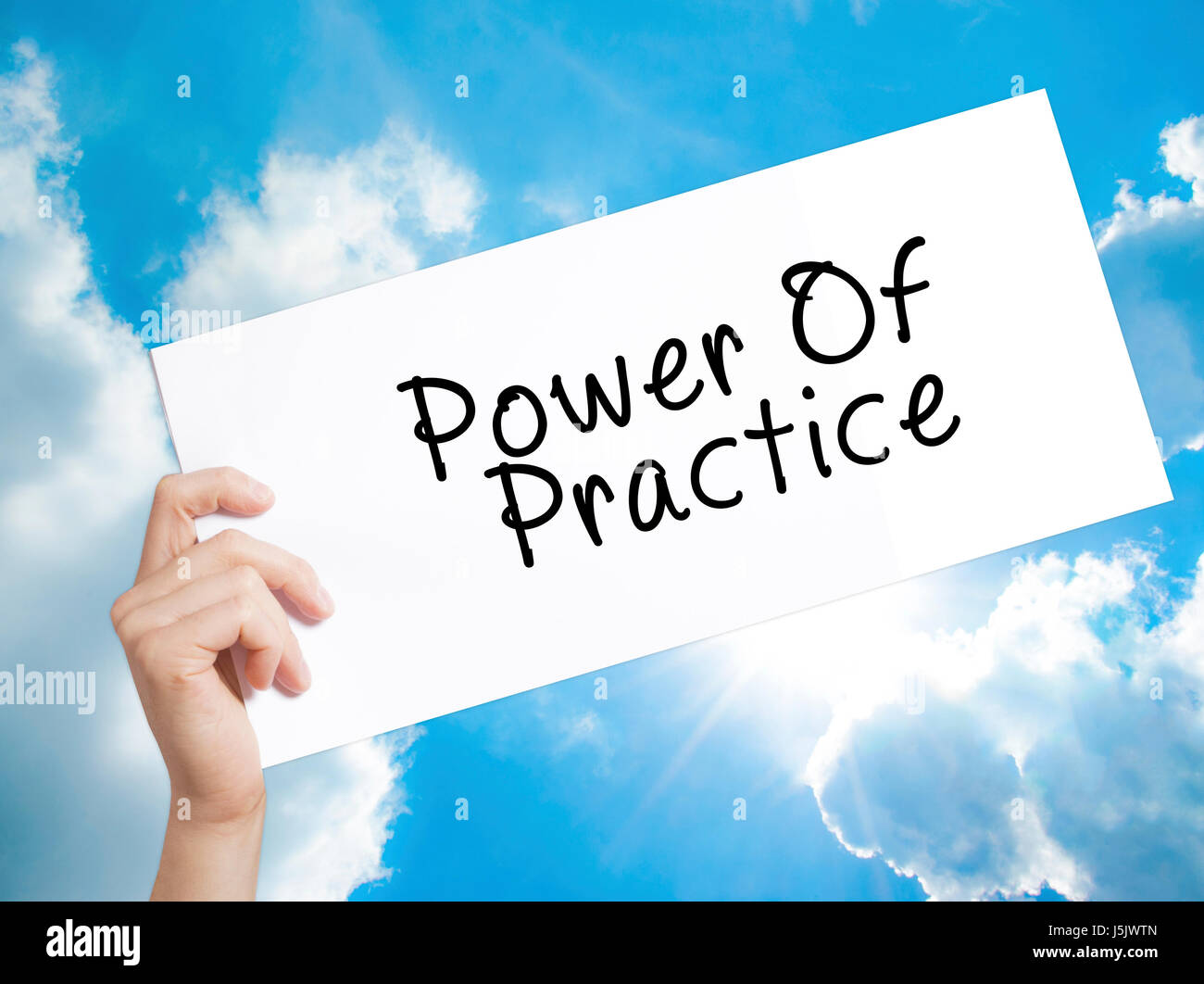 Power Of Practice Sign on white paper. Man Hand Holding Paper with text ...