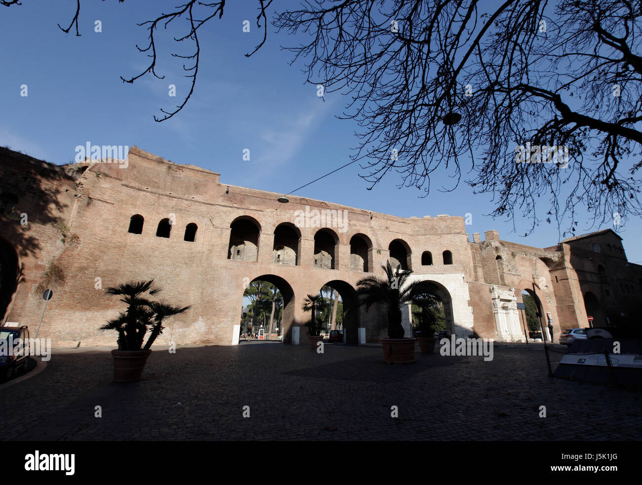 sunlit view of Porta Pinciana, old city wall, Rome, Italy Stock Photo