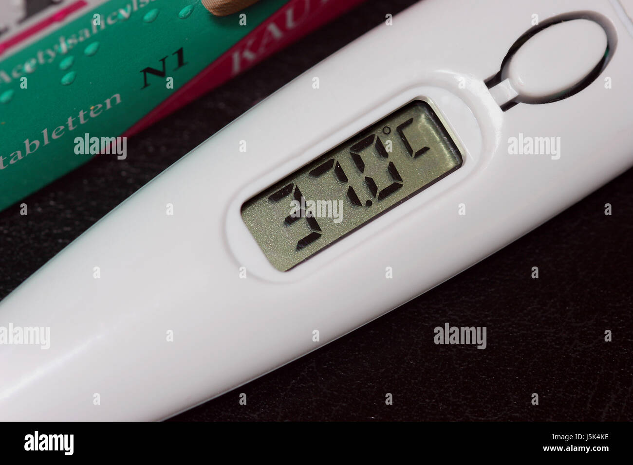 Thermometer measures the temperature of the water Stock Photo - Alamy