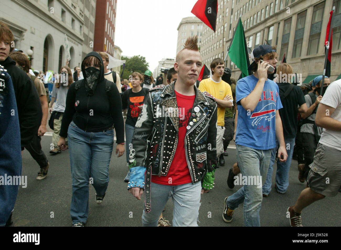 Black Bloc Anarchists take over a street during the anti-war march on Washington. Stock Photo