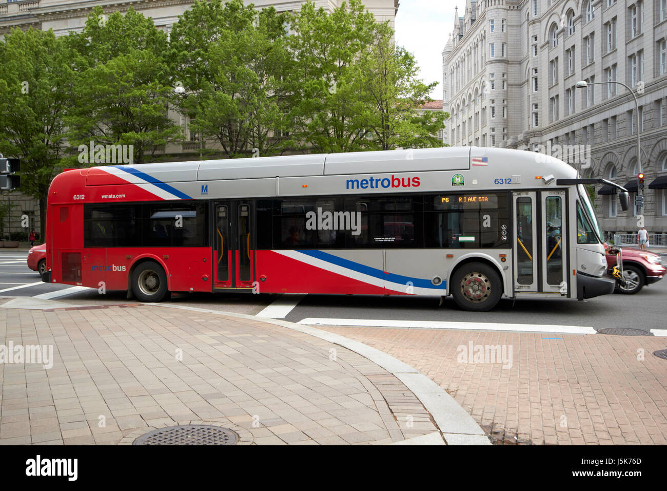 wmata washington metrobus xcelsior hybrid diesel electric bus by new flyer industries Washington DC USA, deliberate motion blur Stock Photo