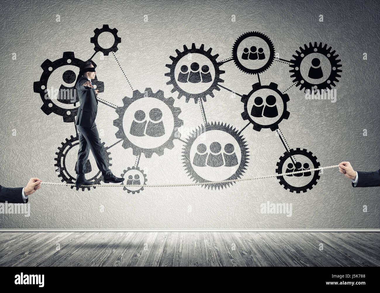 Business concept of risk support and assistance with man balancing on ...