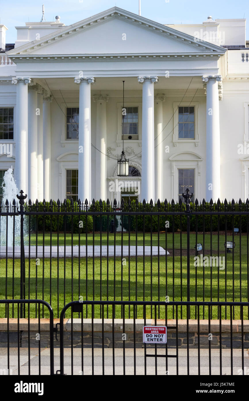 security fencing and restricted area sign outside north facade of the White House Washington DC USA Stock Photo