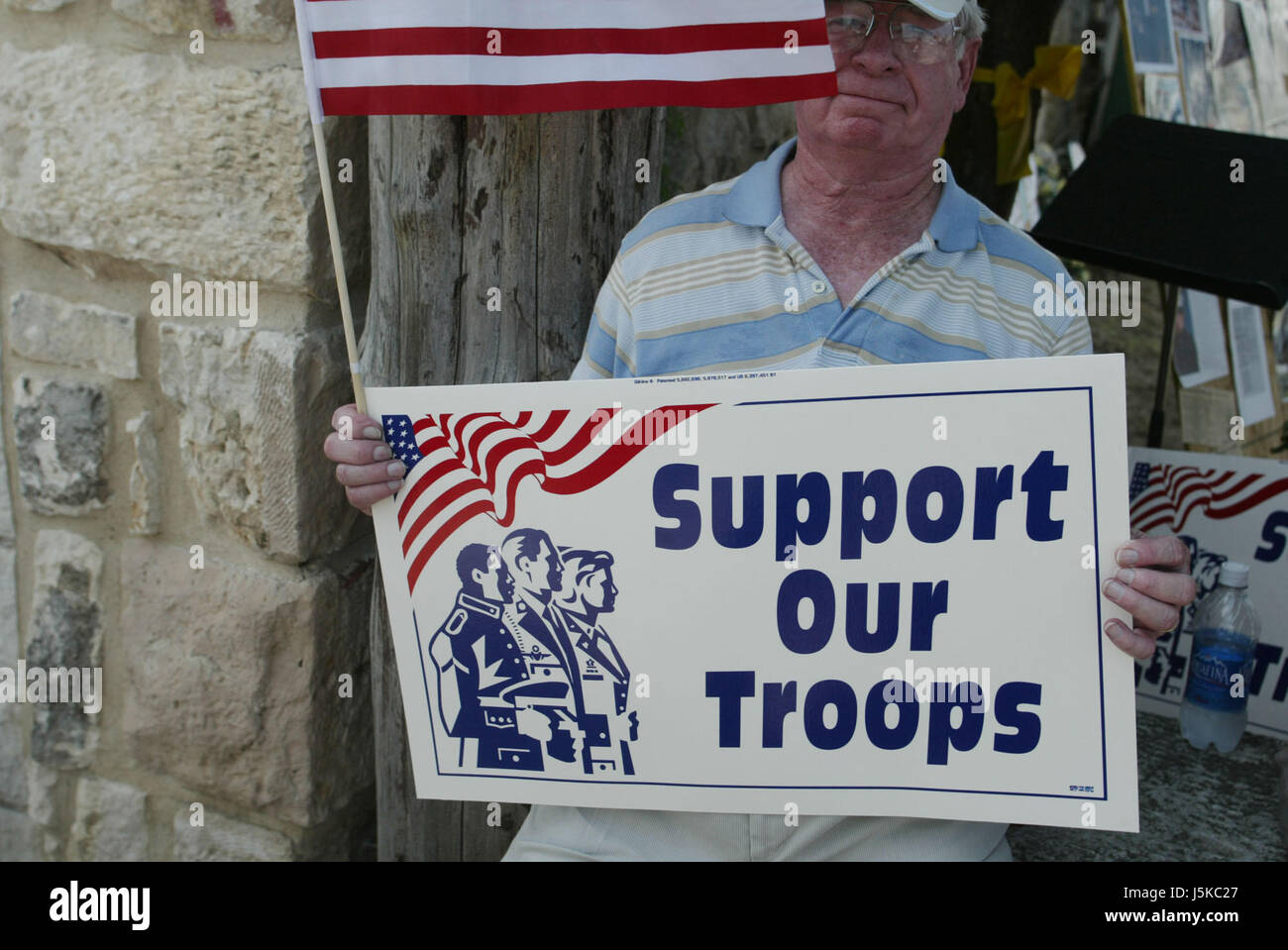 a Bush and Troops supports counter protests near the Yellow Rose during the Cindy Sheehan VigilProtests against George W Bush take place near his home in Crawford, Texas over the summer of 2005. Anti-War activist Cindy Sheehan had begun the protests after her son Casey Sheehan was killed in Iraq during the U.S. invasion. Sheehan demanded that Bush talk to her about the war, and when he didn't, she set up a protest outside his ranch. Stock Photo