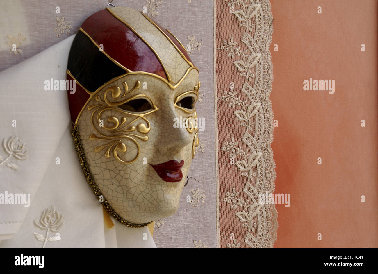 venice masks carnival tradition painted linen larva masked-ball  embroideries Stock Photo - Alamy