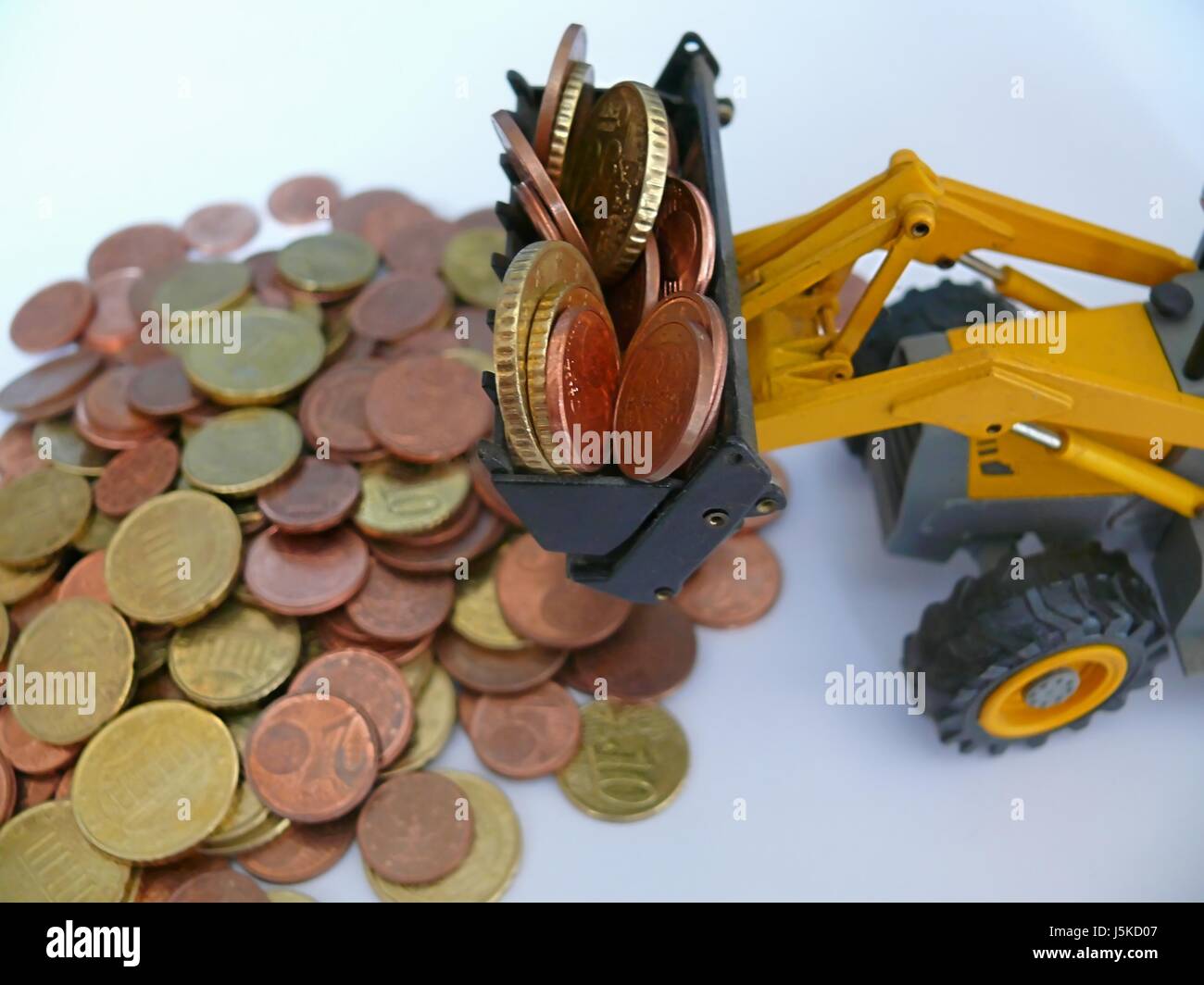 change,cent,price,merit,wages,wage,bagger geld,baggerschaufel,fleiss,centberg Stock Photo