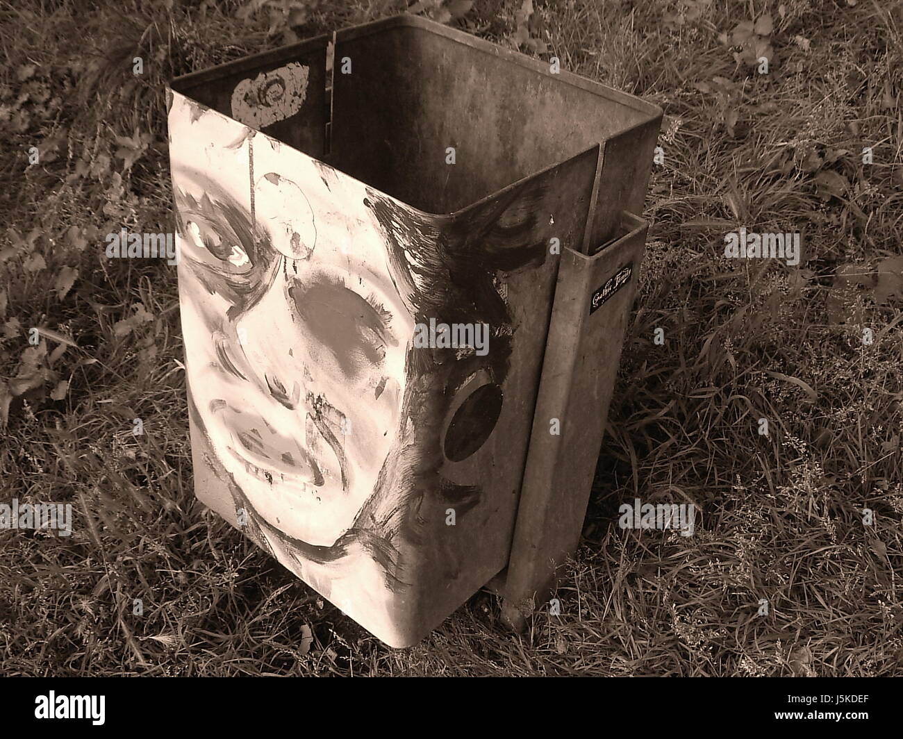 face garbage can painted spray photo picture image copy deduction