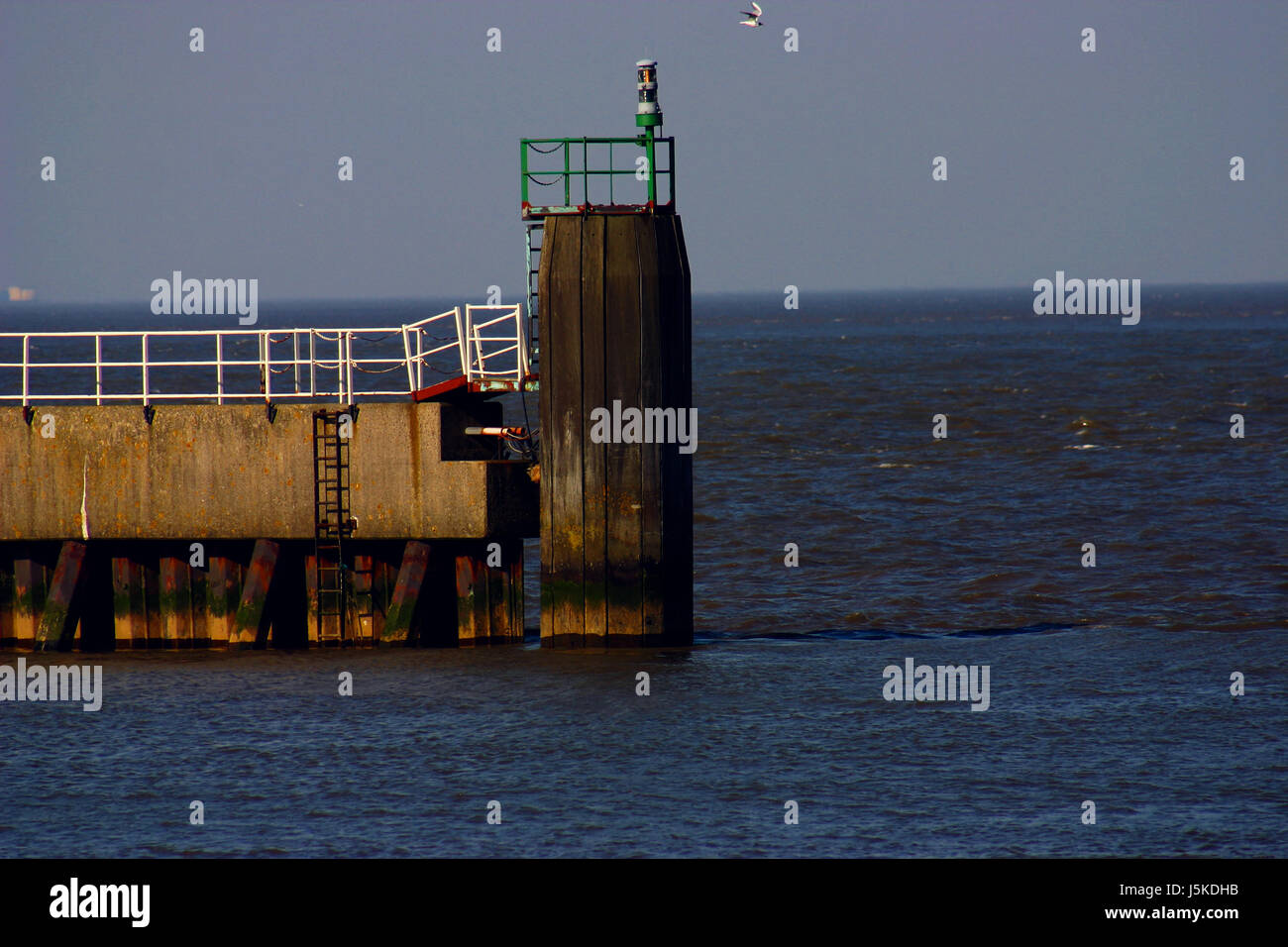 blue water north sea salt water sea ocean harbor harbours railing high ...